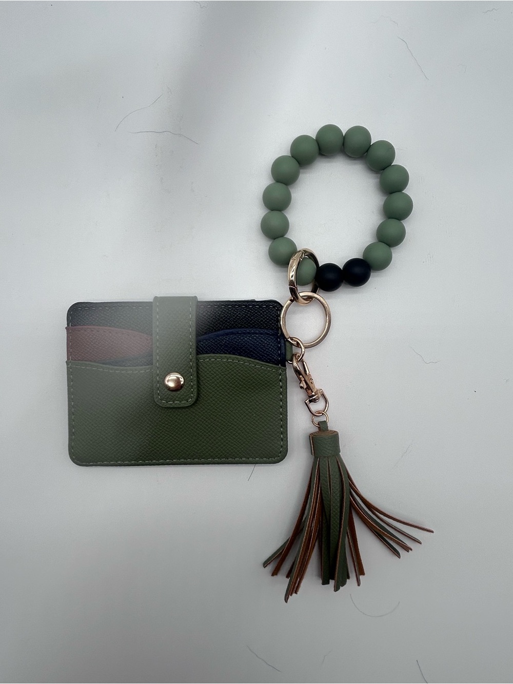 Try colored wallet with wristlet and tassel